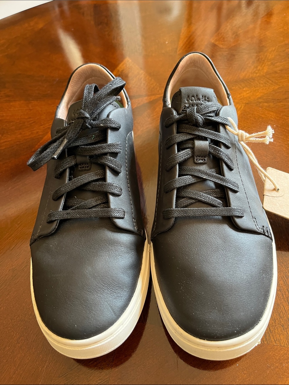 Olukai Black Leather Low-Top Sneakers with White Sole